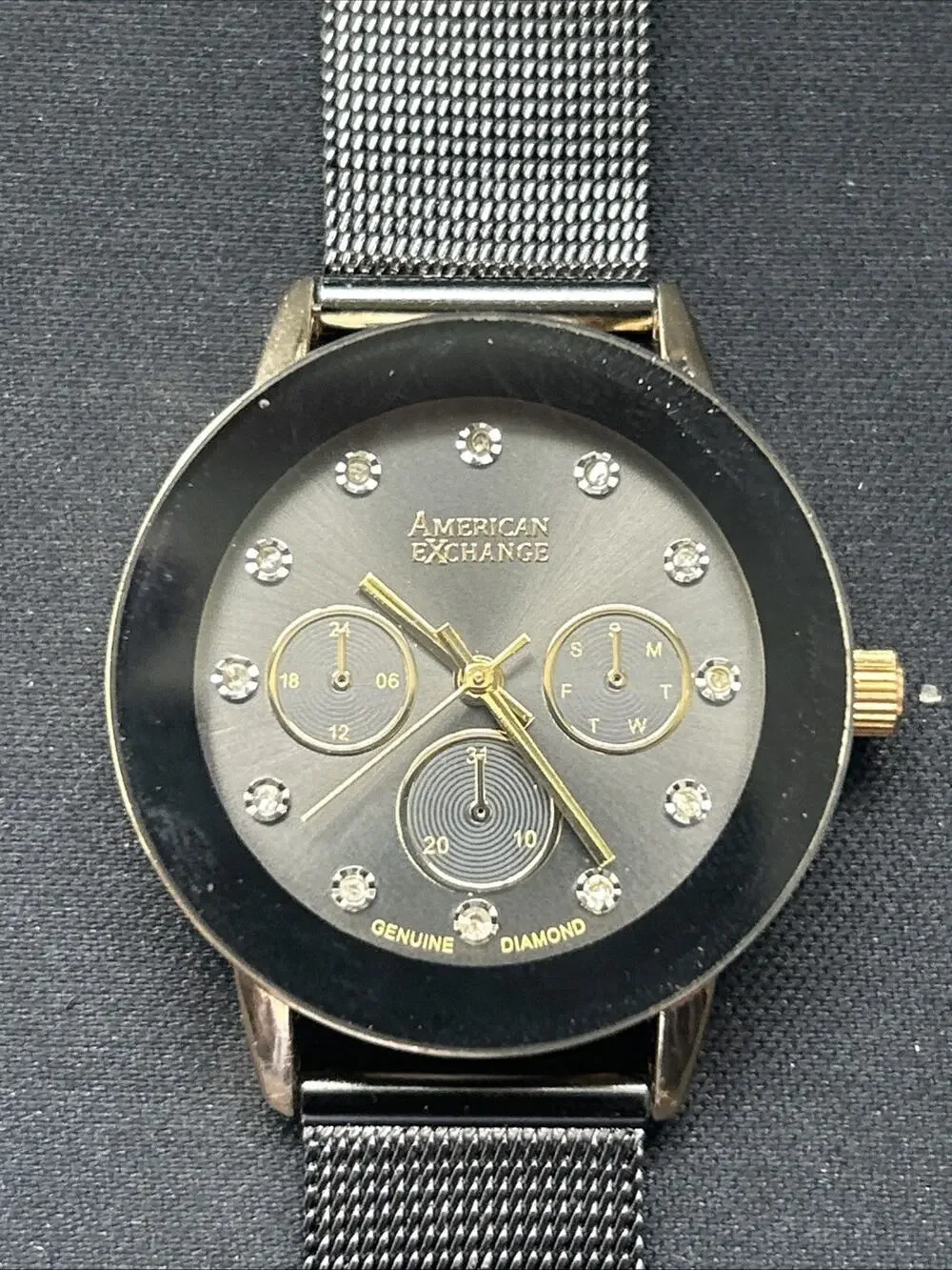 American Exchange Gold Tone Case Black Dial And Bezel Women’s Quartz Watch